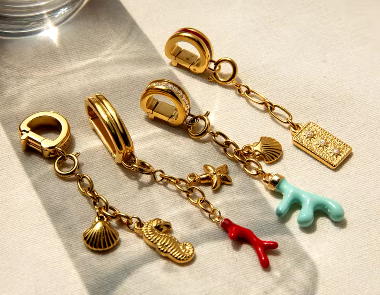 CHARMS WITH CLASP